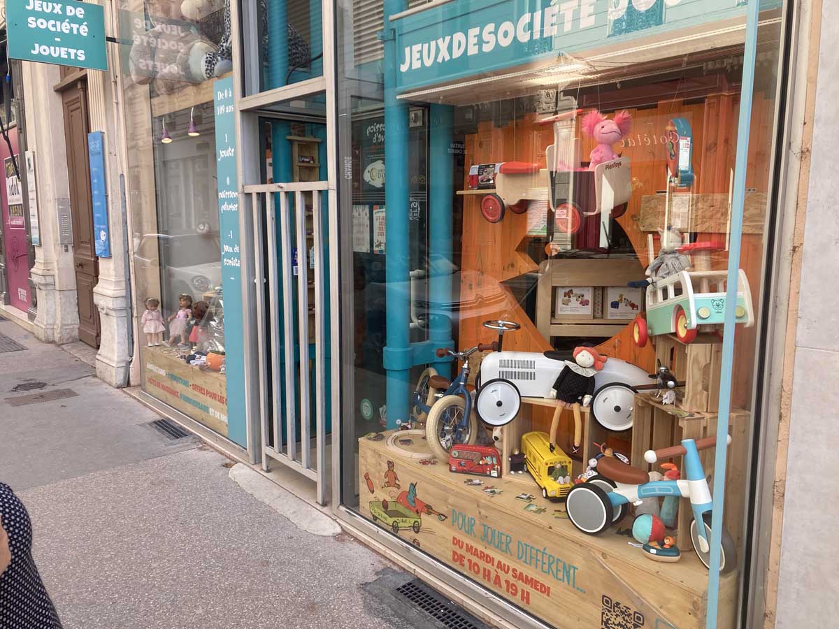 Window of toy shop with old school toys