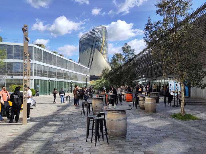 Market and small college with wine museum in background