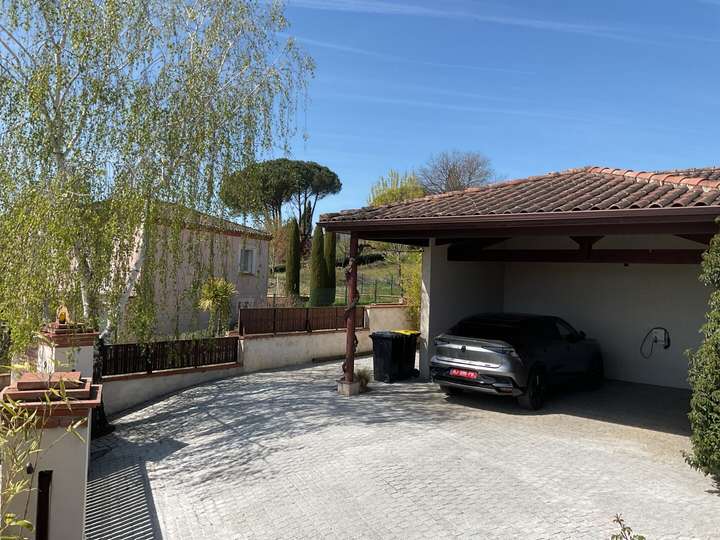 Driveway and carport with pavers