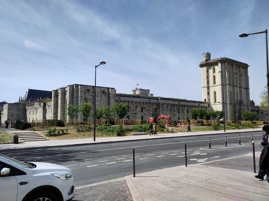 Large castle with city street in foreground