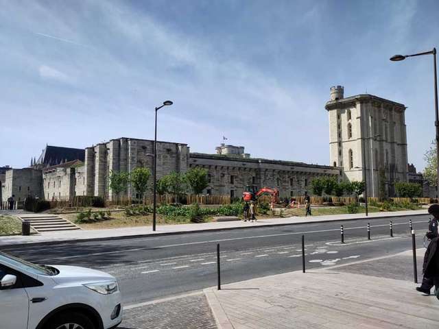 Large castle with city street in foreground